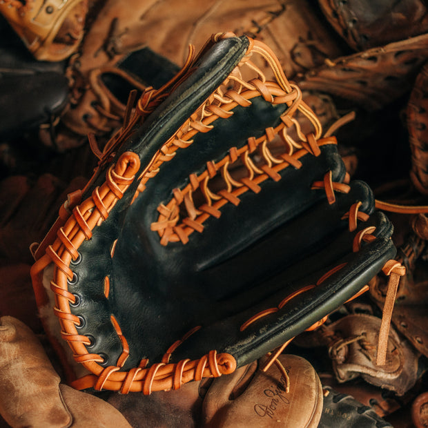 Detailed view of full service baseball glove repair